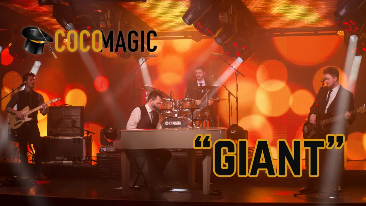 Four musicians performing on stage with a keyboard, guitar, bass, and drums under warm orange lights; text reads 'COCO MAGIC' and 'GIANT'.